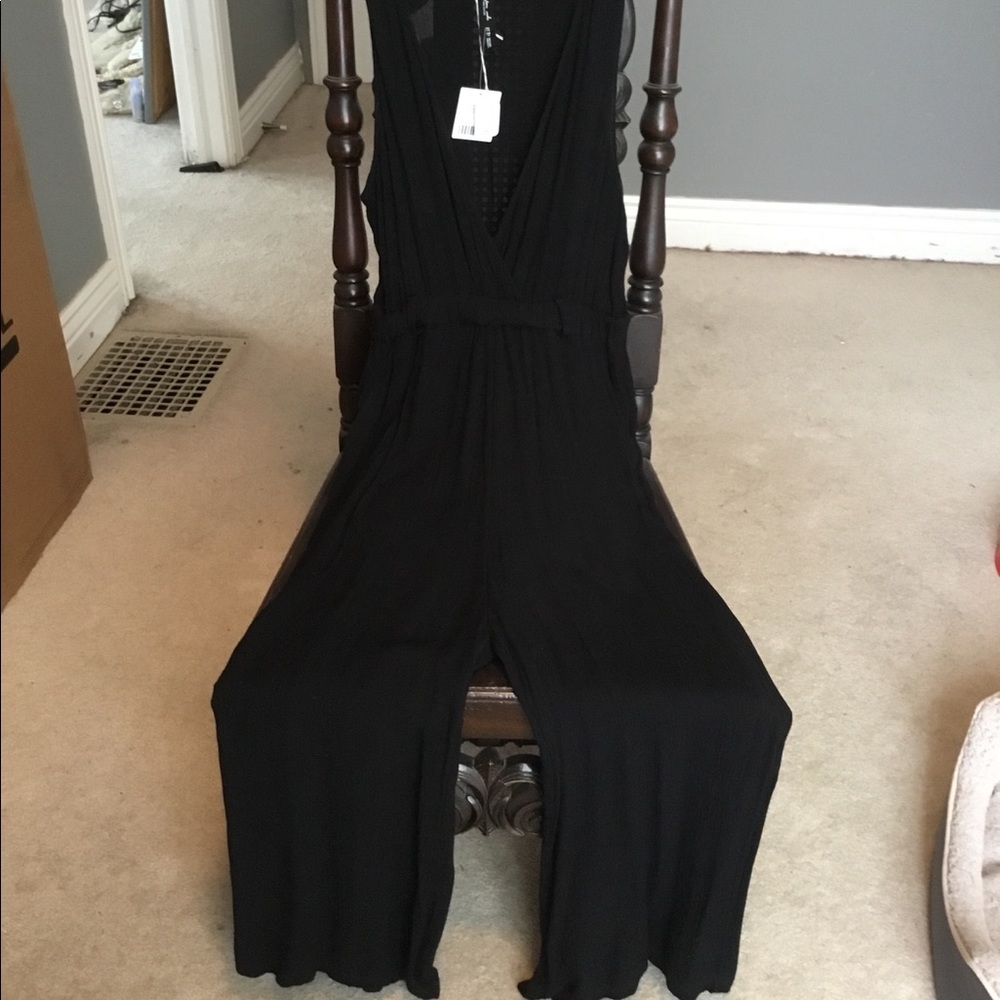 NWT! Gauzy black jumpsuit-WITH POCKETS.  Sz XS